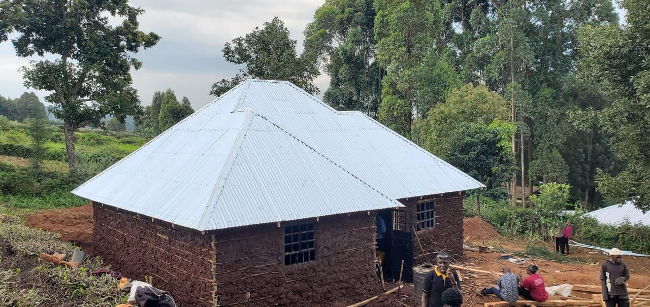 A widow's home built by 3AM volunteers